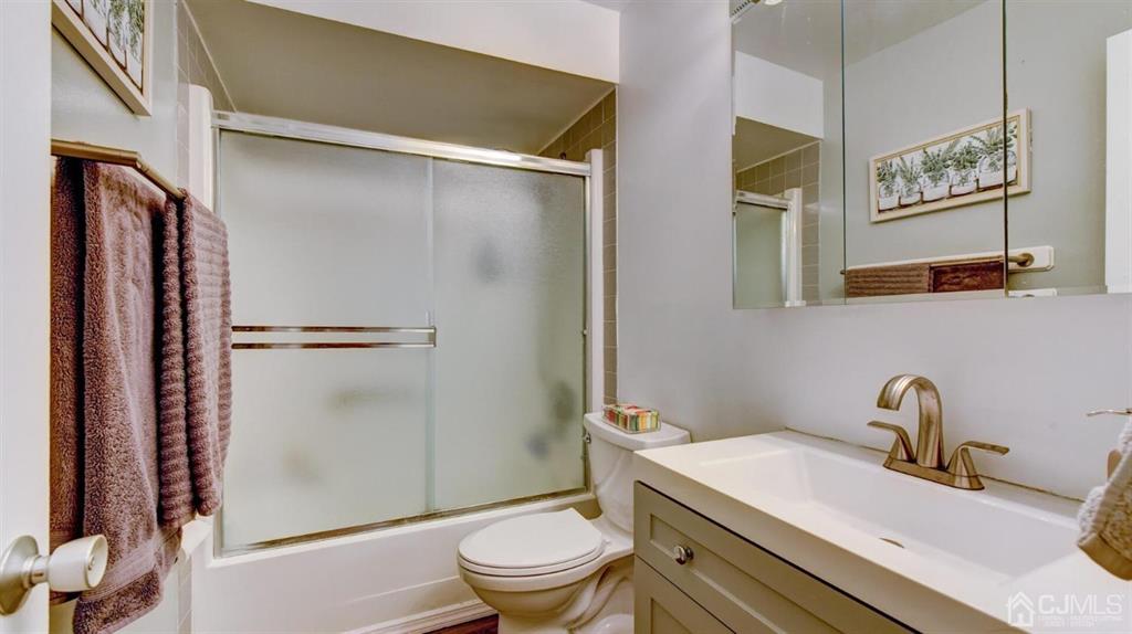 3 The Crescent Clinton, NJ 08809 - Photo 27 of 37 a bathroom with a sink toilet and shower