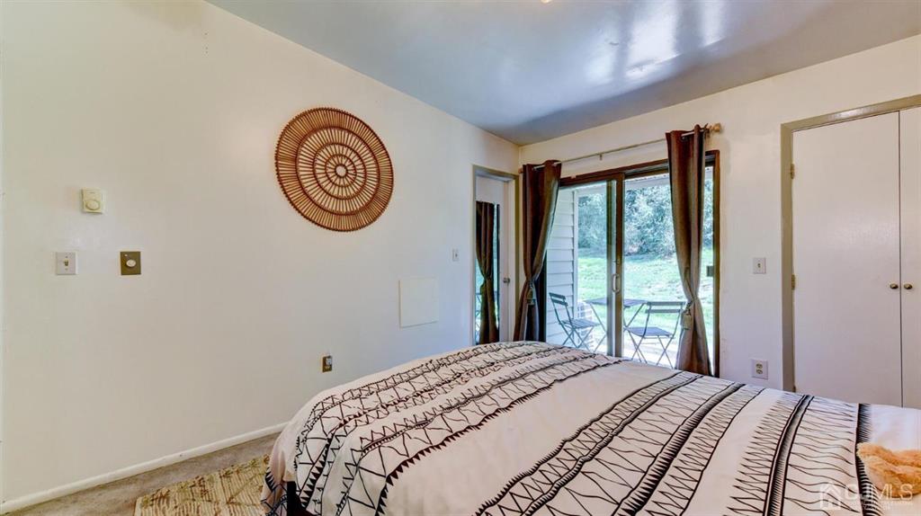 3 The Crescent Clinton, NJ 08809 - Photo 29 of 37 a bedroom with a bed and a window