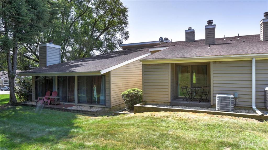 3 The Crescent Clinton, NJ 08809 - Photo 32 of 37 a view of a house with a yard and plants