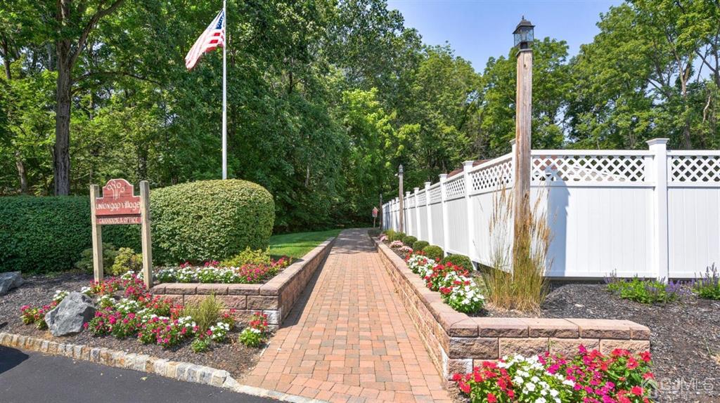 3 The Crescent Clinton, NJ 08809 - Photo 35 of 37 a view of a potted flower in a yard with swimming pool