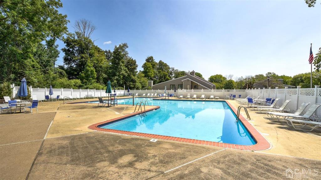 3 The Crescent Clinton, NJ 08809 - Photo 36 of 37 a view of a swimming pool with an outdoor seating