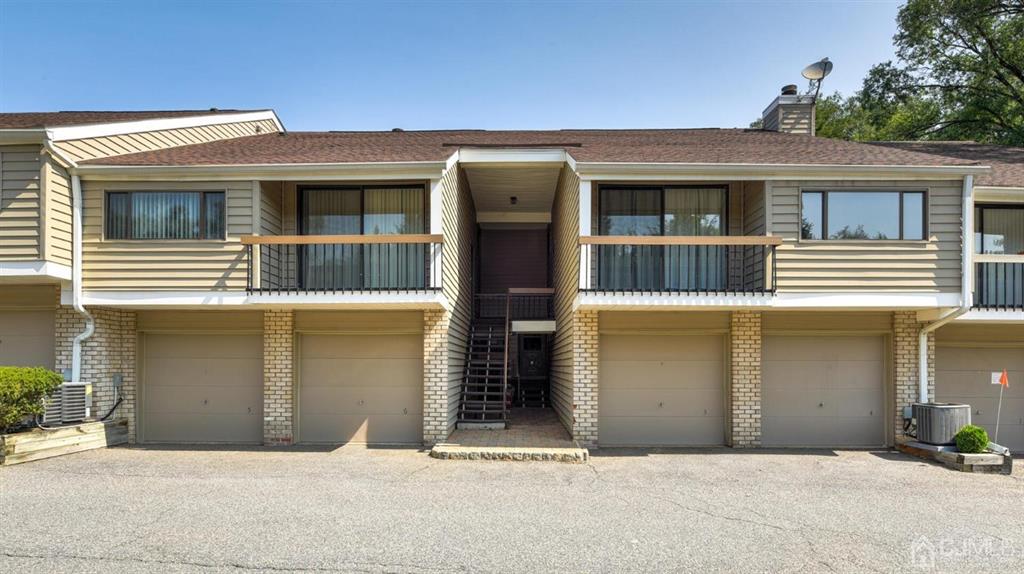 3 The Crescent Clinton, NJ 08809 - Photo 5 of 37 a front view of a house