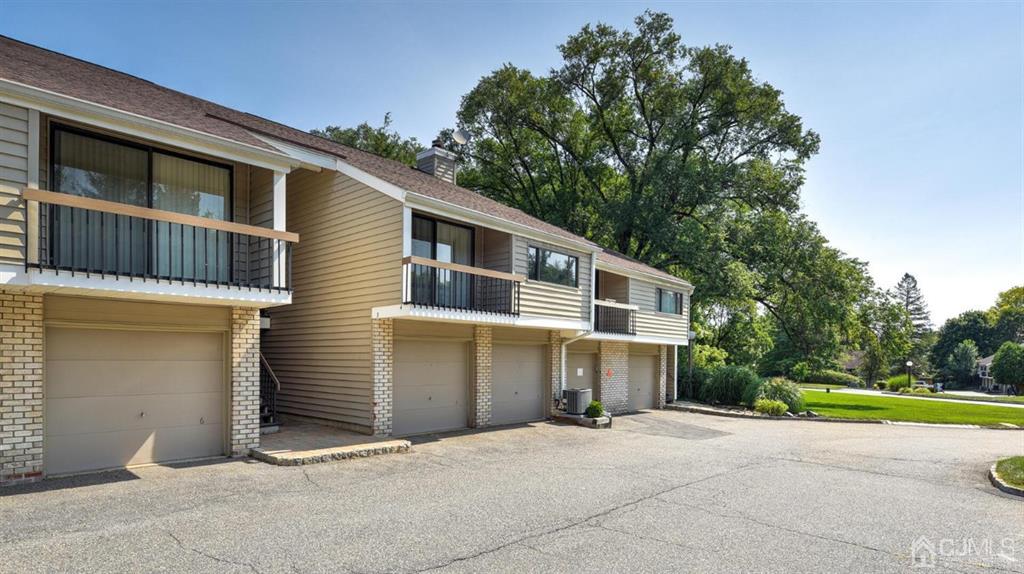 3 The Crescent Clinton, NJ 08809 - Photo 6 of 37 a view of a house with a yard and large tree