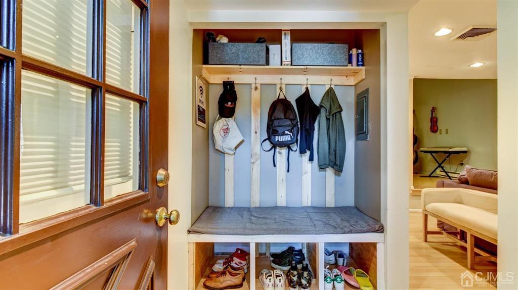 3 The Crescent Clinton, NJ 08809 - Photo 8 of 37 a view of living room with furniture and a fireplace