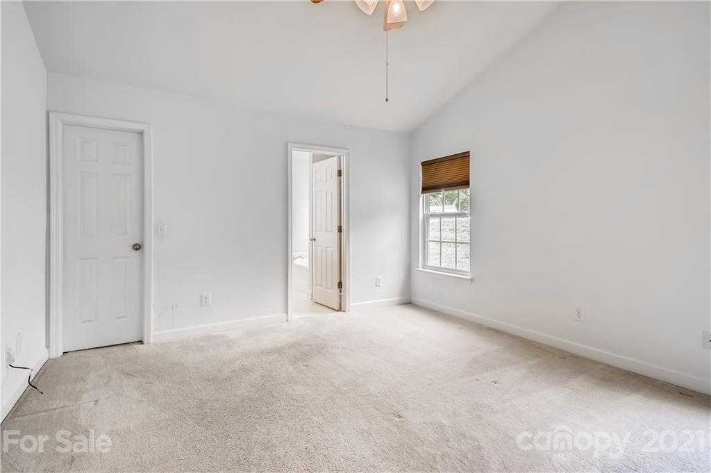 1416 Key Ridge Court Charlotte, NC 28216 - Photo 14 of 28 a view of an empty room with a window