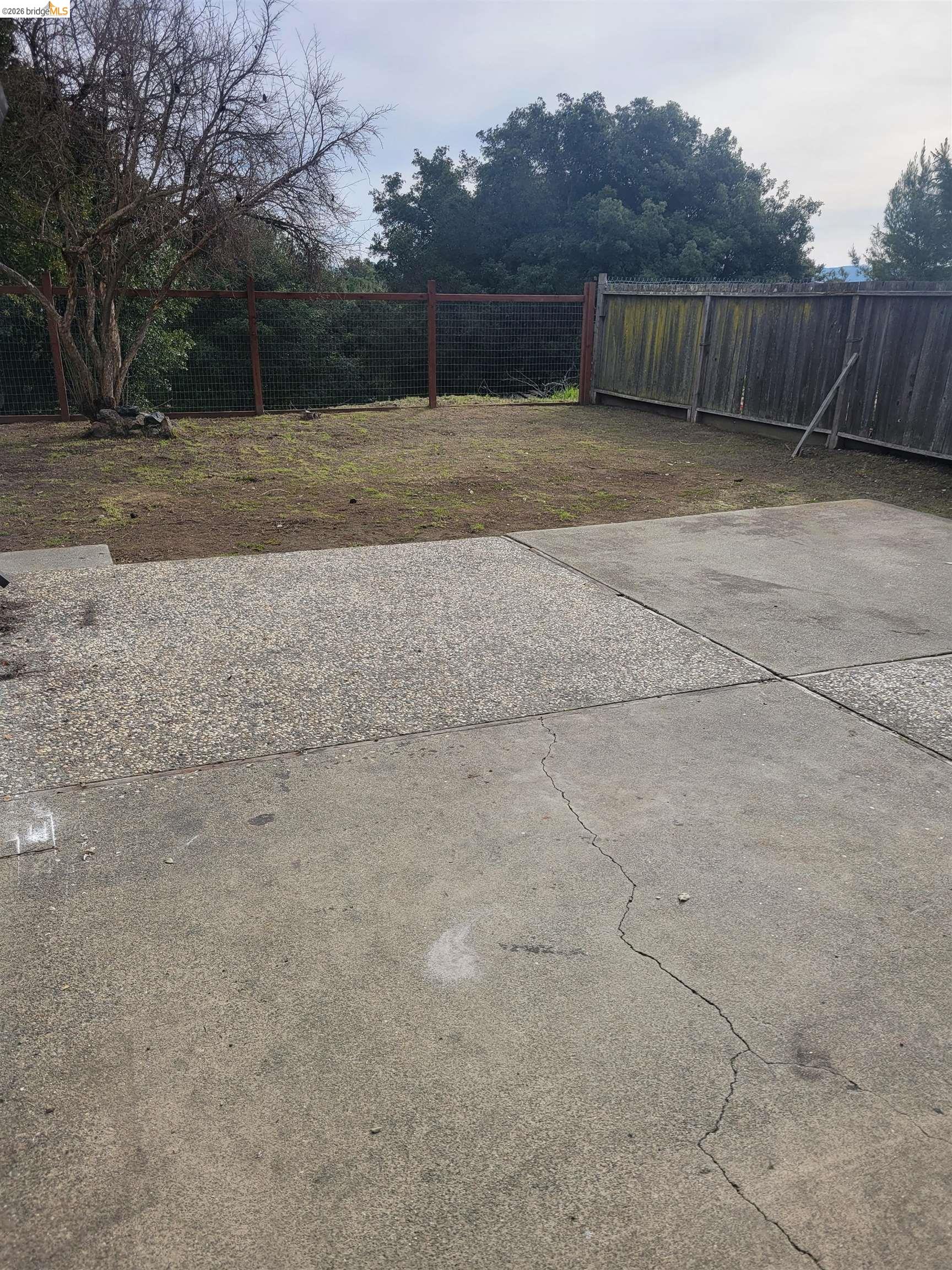 906 Coral Drive Rodeo, CA 94572 - Photo 14 of 21 a view of a backyard