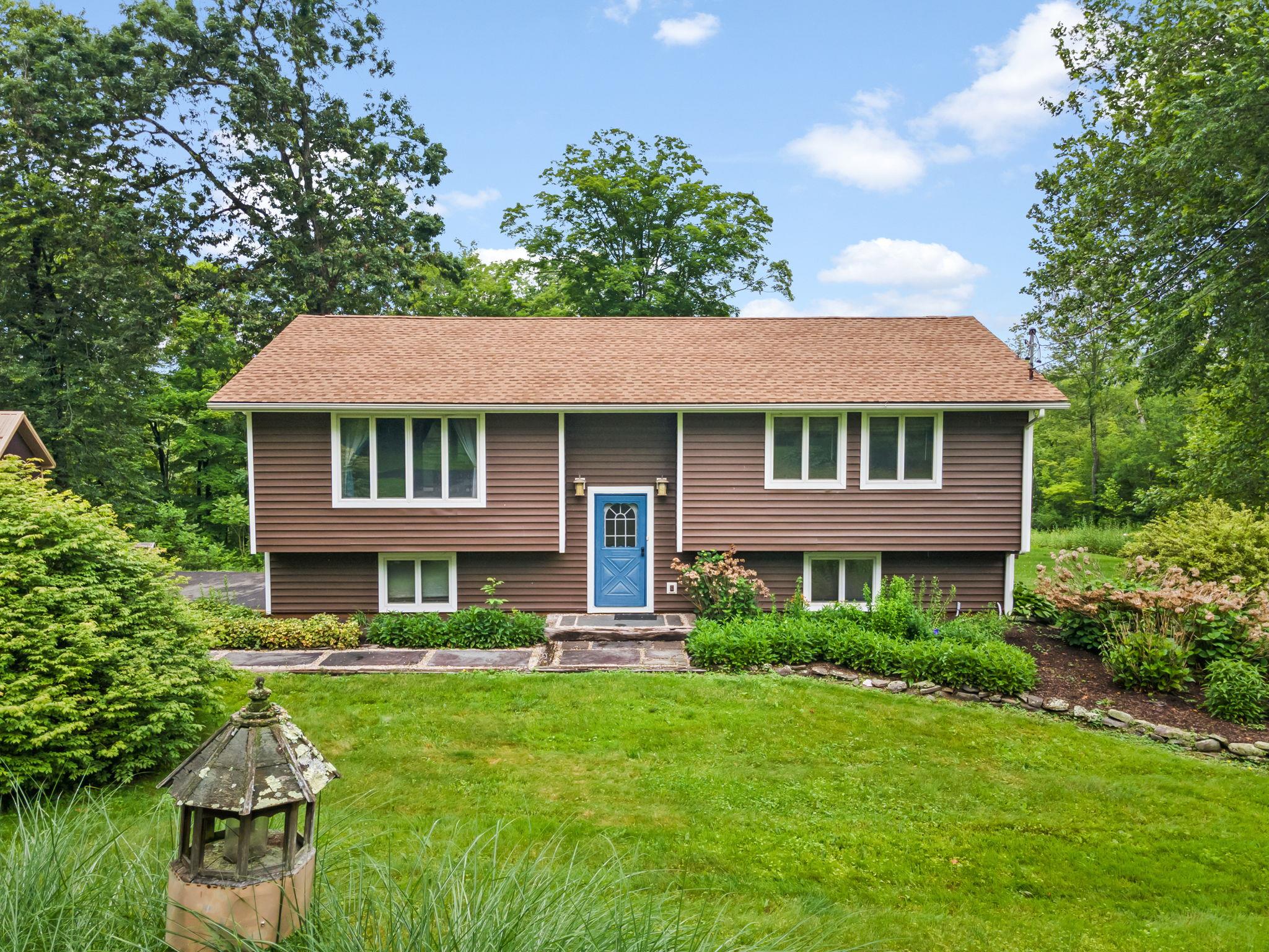 417 New Hurley Road Modena, NY 12548 - Photo 1 of 1 a front view of a house with a yard