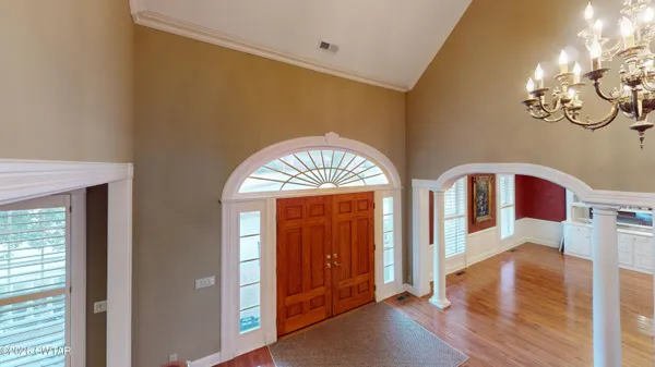 a view of front door with hallway