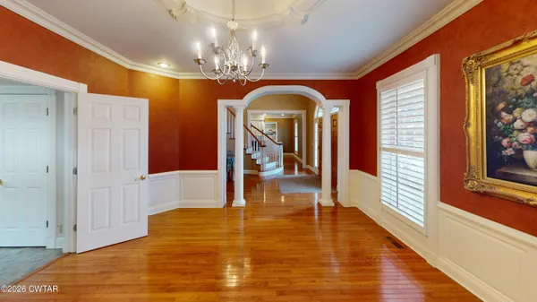 a view of a livingroom with a swimming pool