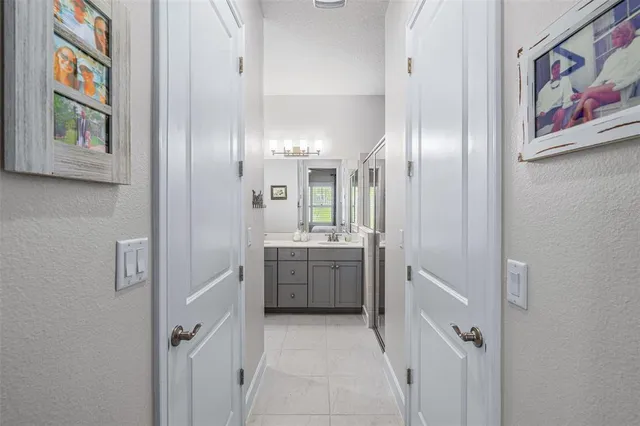 a bathroom with a vanity and a mirror