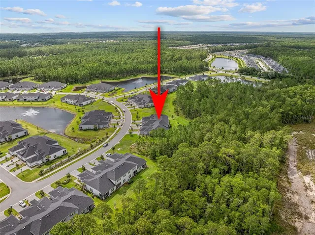 a view of an outdoor space pool patio and outdoor seating