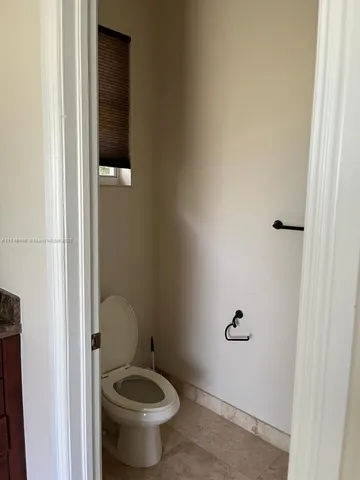 a bathroom with a toilet