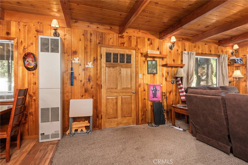 42031 North Aspen Road Shaver Lake, CA 93664 - Photo 11 of 49 a view of a hallway with seating area