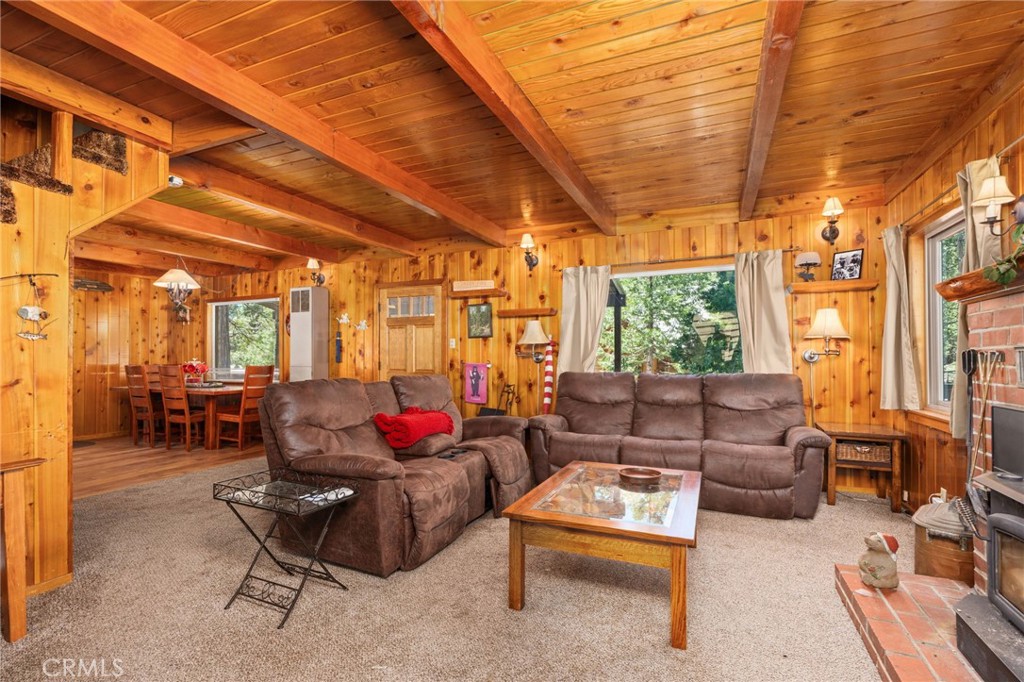 42031 North Aspen Road Shaver Lake, CA 93664 - Photo 20 of 49 a living room with furniture and a large window