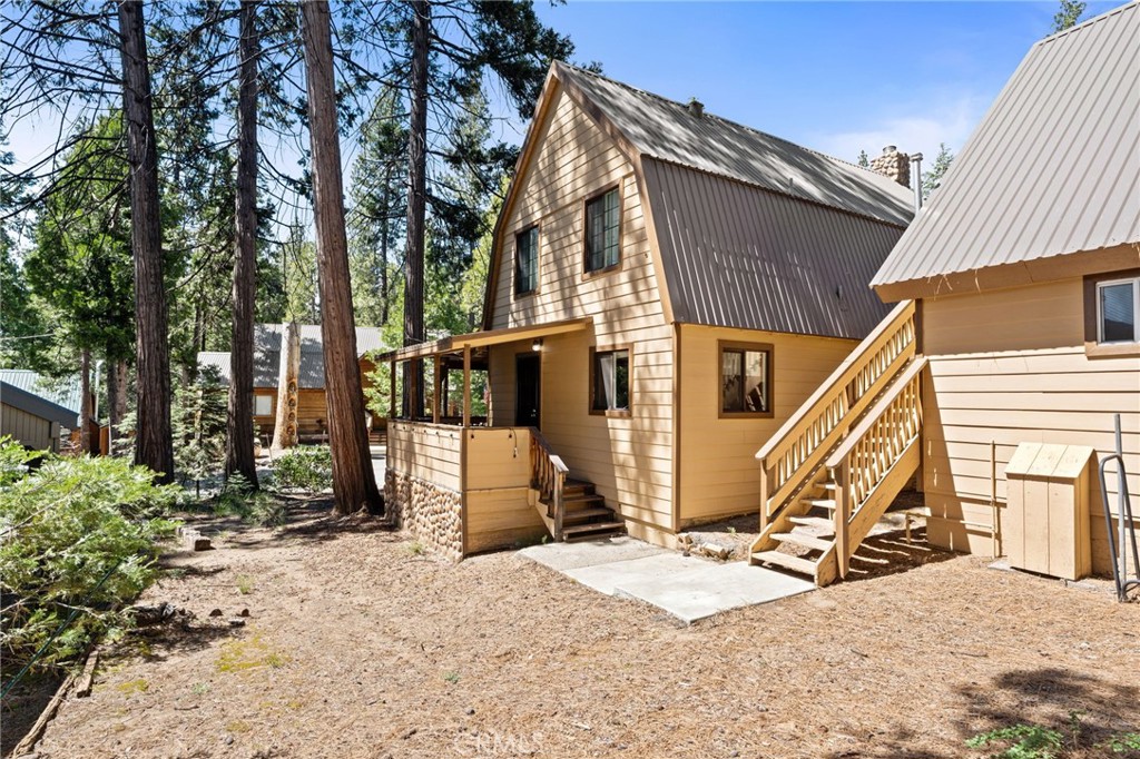 42031 North Aspen Road Shaver Lake, CA 93664 - Photo 35 of 49 a view of a house with a park