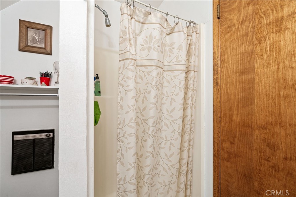 42031 North Aspen Road Shaver Lake, CA 93664 - Photo 40 of 49 a utility room with shower and mirror
