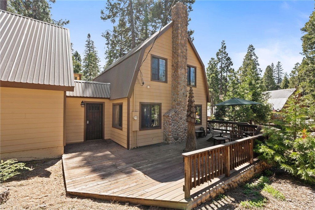 42031 North Aspen Road Shaver Lake, CA 93664 - Photo 4 of 49 a view of a house with backyard