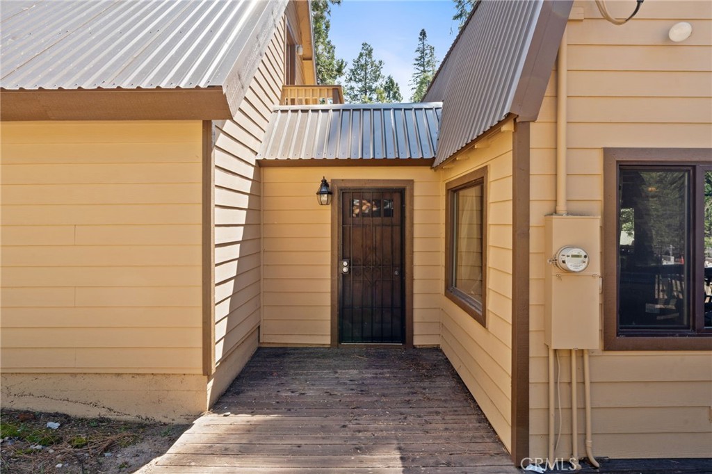 42031 North Aspen Road Shaver Lake, CA 93664 - Photo 46 of 49 a view of a entryway door front of house