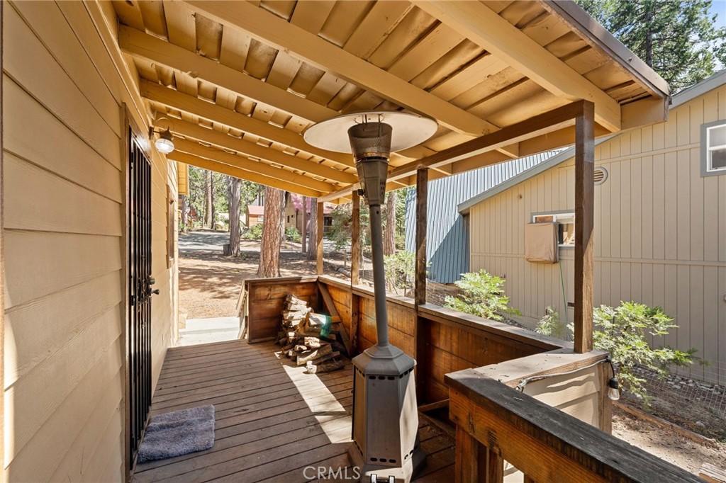42031 North Aspen Road Shaver Lake, CA 93664 - Photo 7 of 49 a view of a living room and a wooden floor