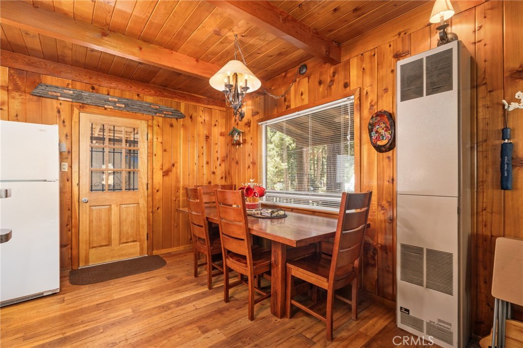 42031 North Aspen Road Shaver Lake, CA 93664 - Photo 10 of 49 a dining room with furniture and window