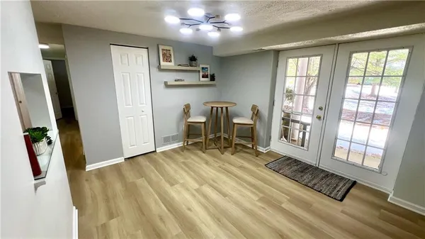 a view of an empty room with a window