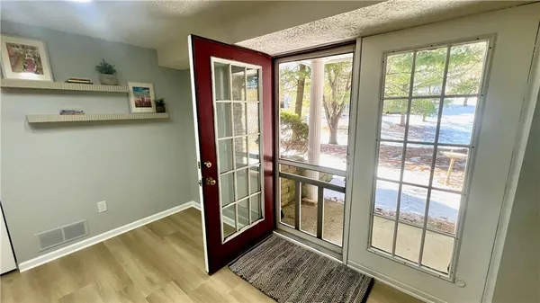 a view of an empty room and window