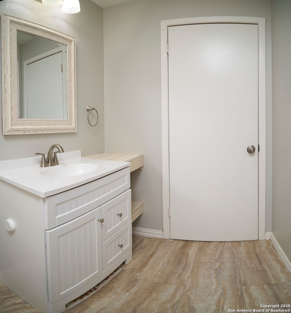 418 Verne Street, Unit 3 San Antonio, TX 78221 - Photo 21 of 21 a bathroom with a sink and a mirror