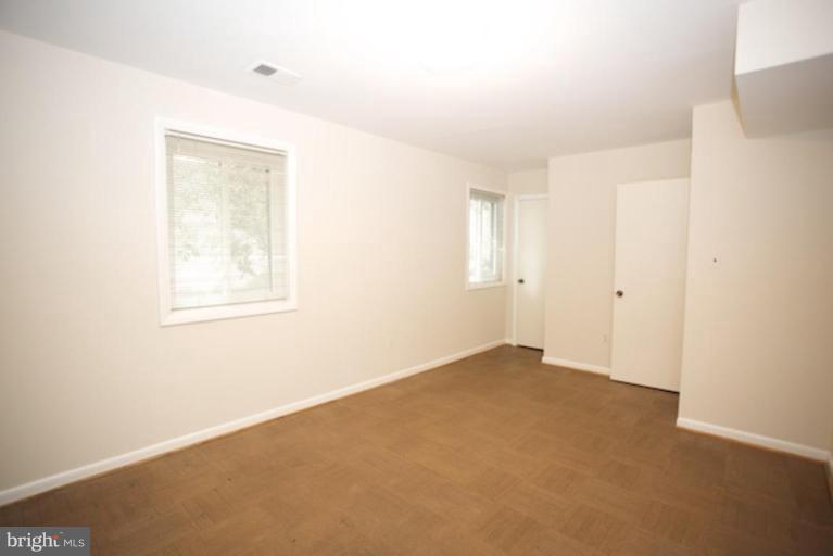 11806 Tree Fern Court Reston, VA 20191 - Photo 12 of 20 an empty room with windows