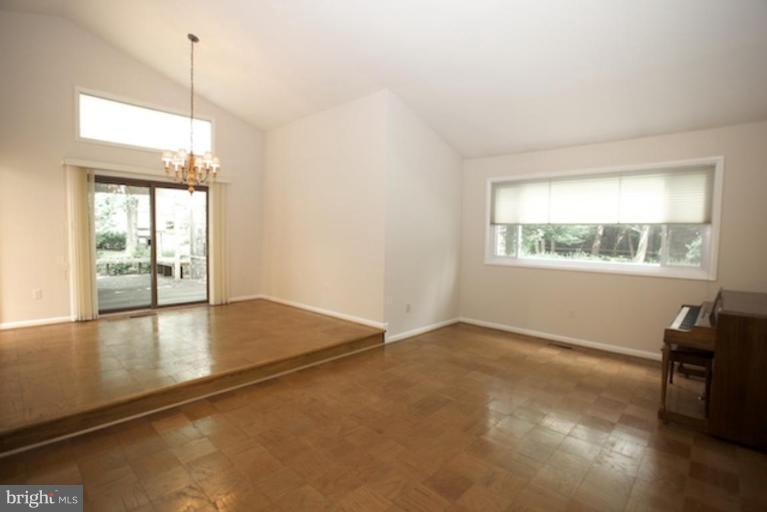 11806 Tree Fern Court Reston, VA 20191 - Photo 6 of 20 a view of an empty room with a window