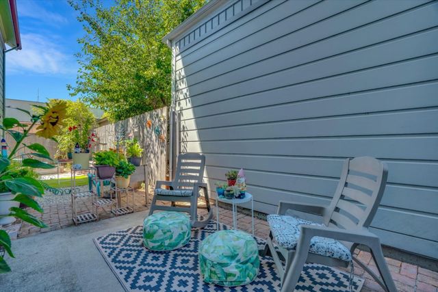 a view of yard with patio