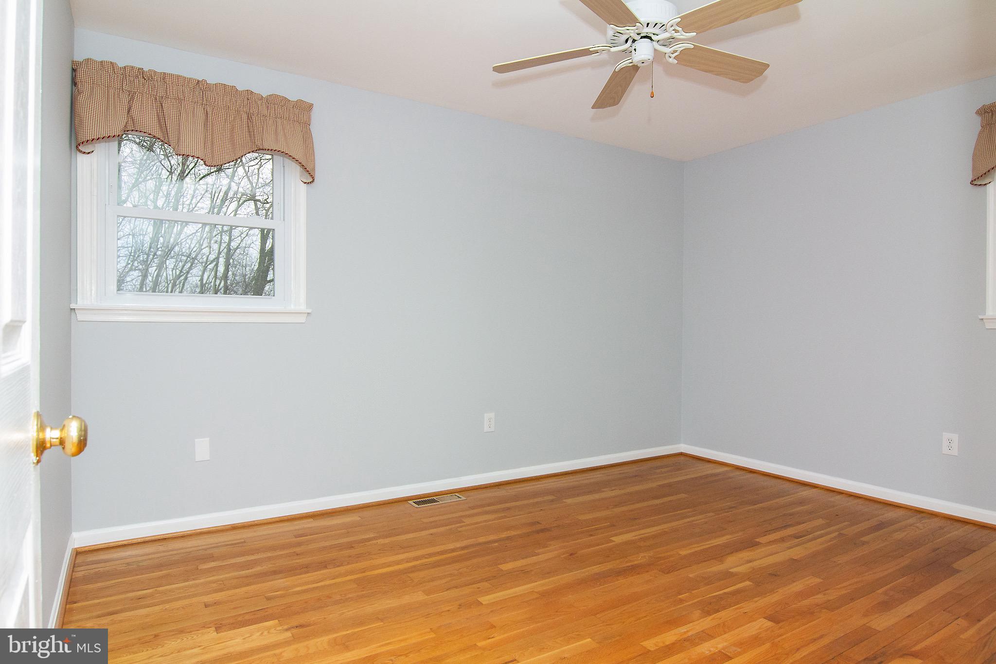 4813 Millers Station Road Hampstead, MD 21074 - Photo 18 of 32 a view of an empty room with a window
