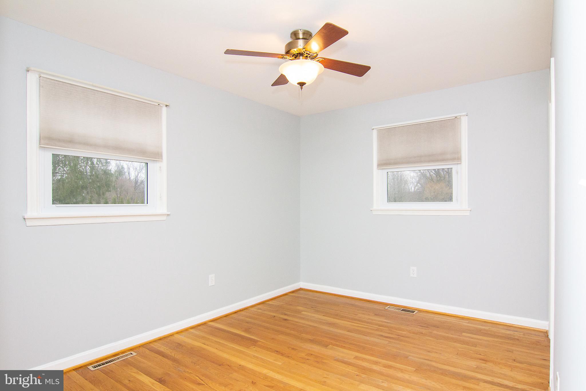 4813 Millers Station Road Hampstead, MD 21074 - Photo 22 of 32 a view of an empty room with a window