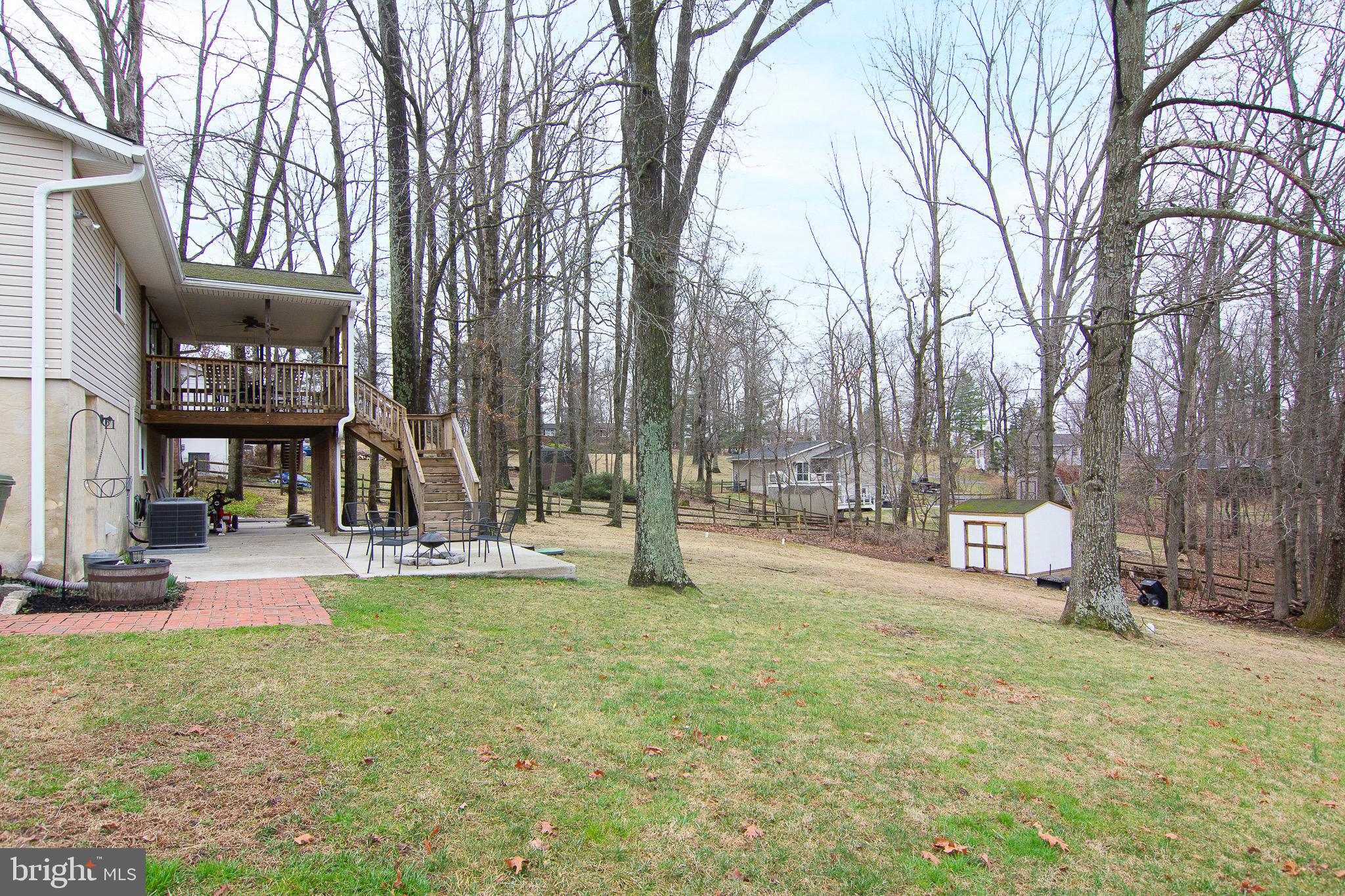 4813 Millers Station Road Hampstead, MD 21074 - Photo 30 of 32 a view of a park with bench and trees