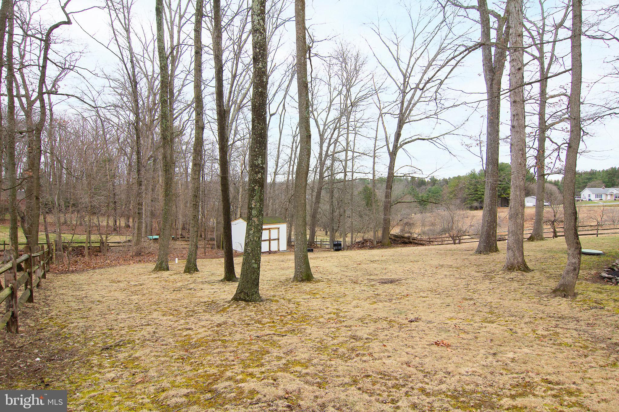4813 Millers Station Road Hampstead, MD 21074 - Photo 31 of 32 a view of a yard with a slide