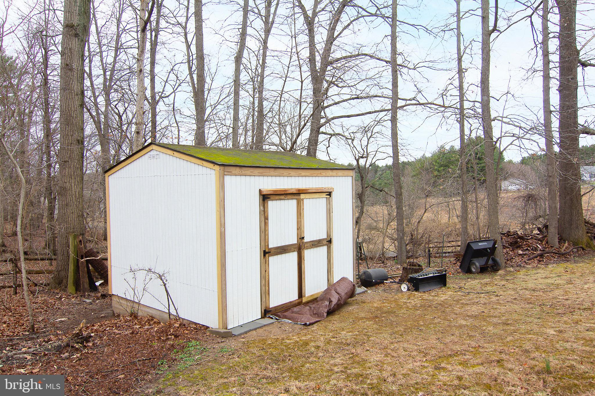 4813 Millers Station Road Hampstead, MD 21074 - Photo 32 of 32 a view of a house with a snow in the yard