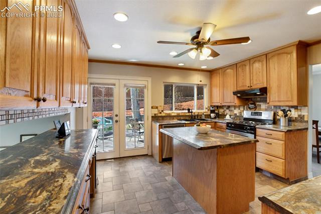 691 Gilcrest Road Colorado Springs, CO 80906 - Photo 6 of 28 Gourmet kitchen with tons of storage