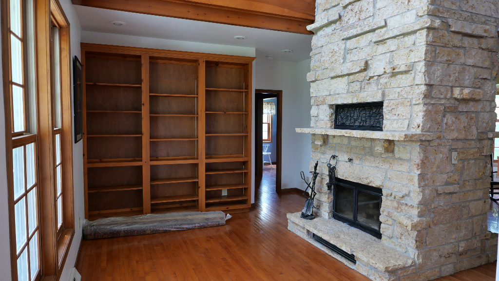 2346 West Longhollow Road Elizabeth, IL 61028 - Photo 23 of 44 a living room with a fireplace