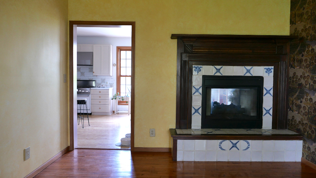 2346 West Longhollow Road Elizabeth, IL 61028 - Photo 36 of 44 a living room with wooden floor and a fireplace