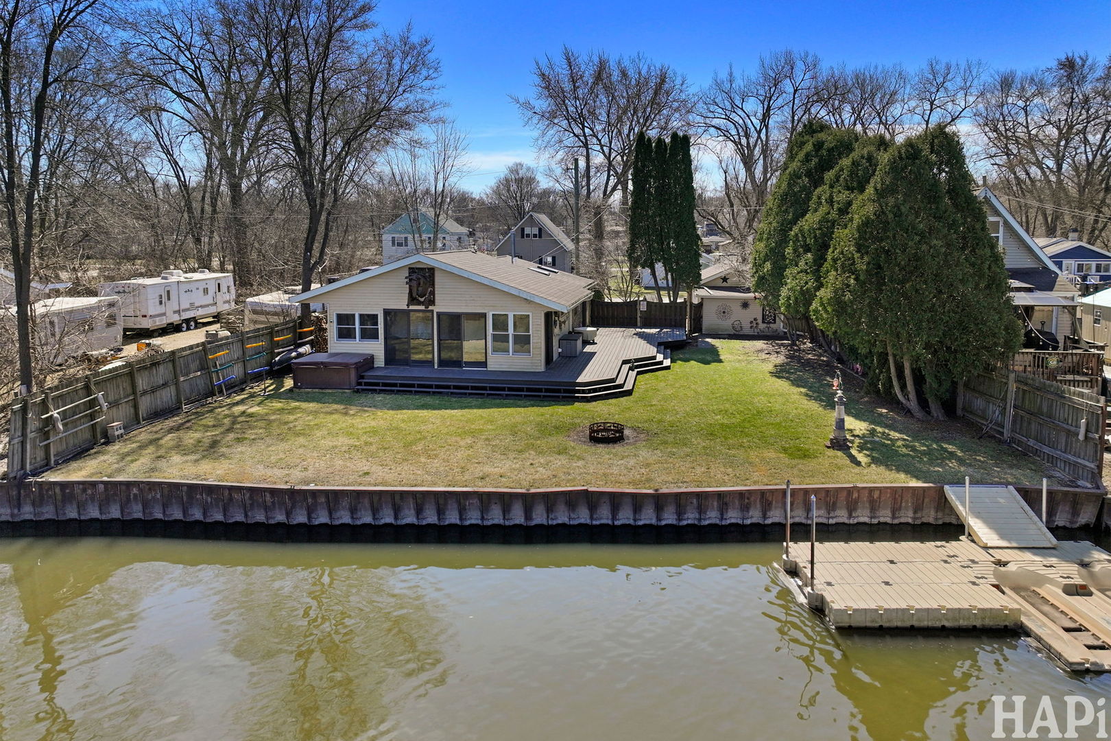 1319 Nippersink Drive Spring Grove, IL 60081 - Photo 1 of 1 a swimming pool covered with tall trees
