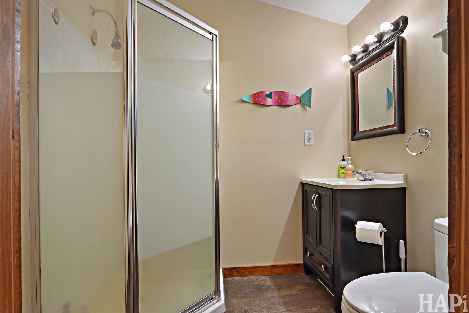 1319 Nippersink Drive Spring Grove, IL 60081 - Photo 13 of 27 a bathroom with a sink toilet and mirror