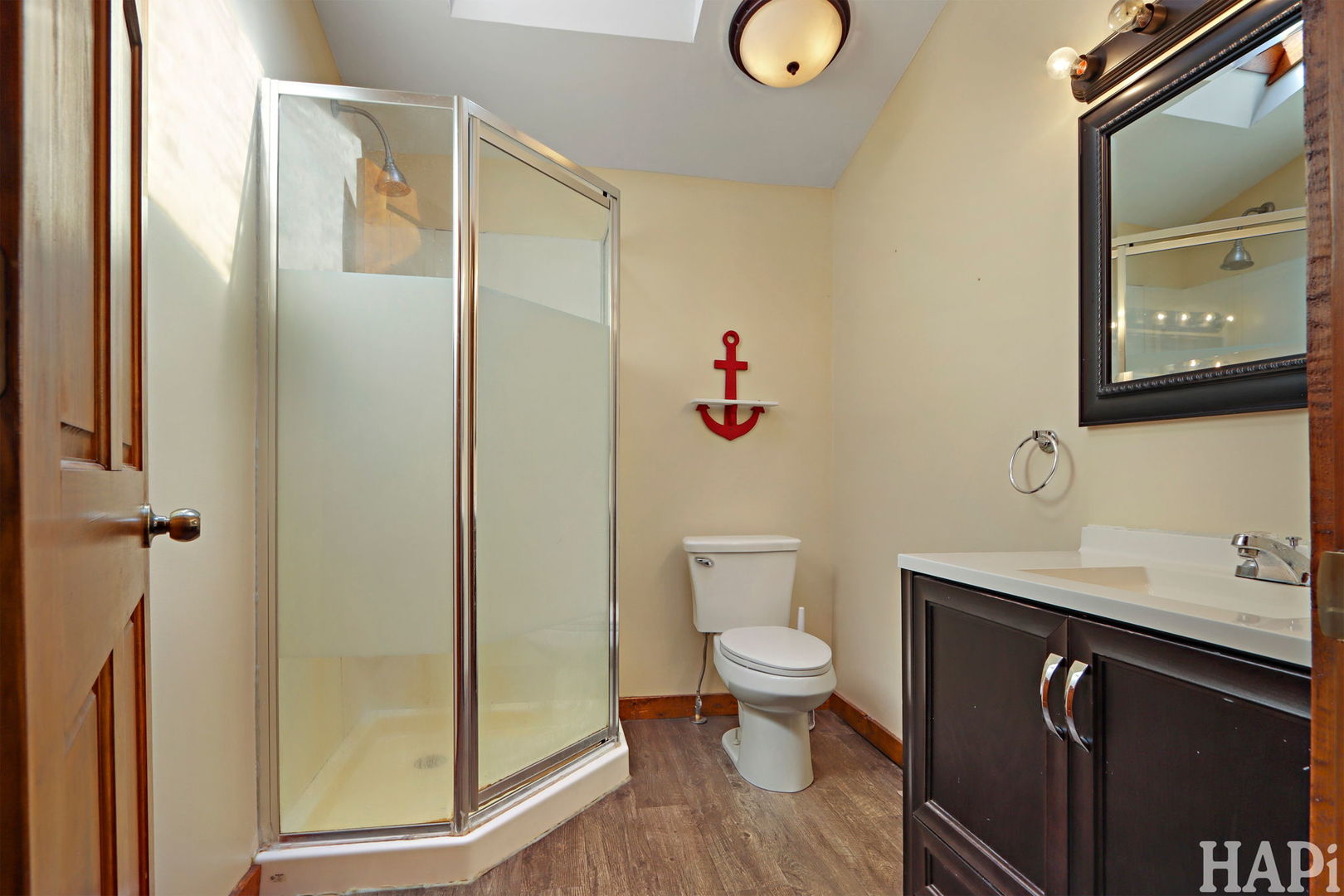 1319 Nippersink Drive Spring Grove, IL 60081 - Photo 15 of 27 a bathroom with a sink a toilet and shower