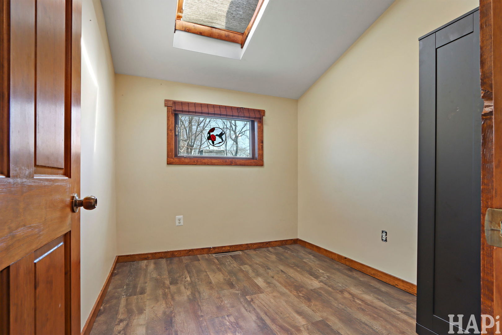 1319 Nippersink Drive Spring Grove, IL 60081 - Photo 16 of 27 a view of a hallway with wooden floor