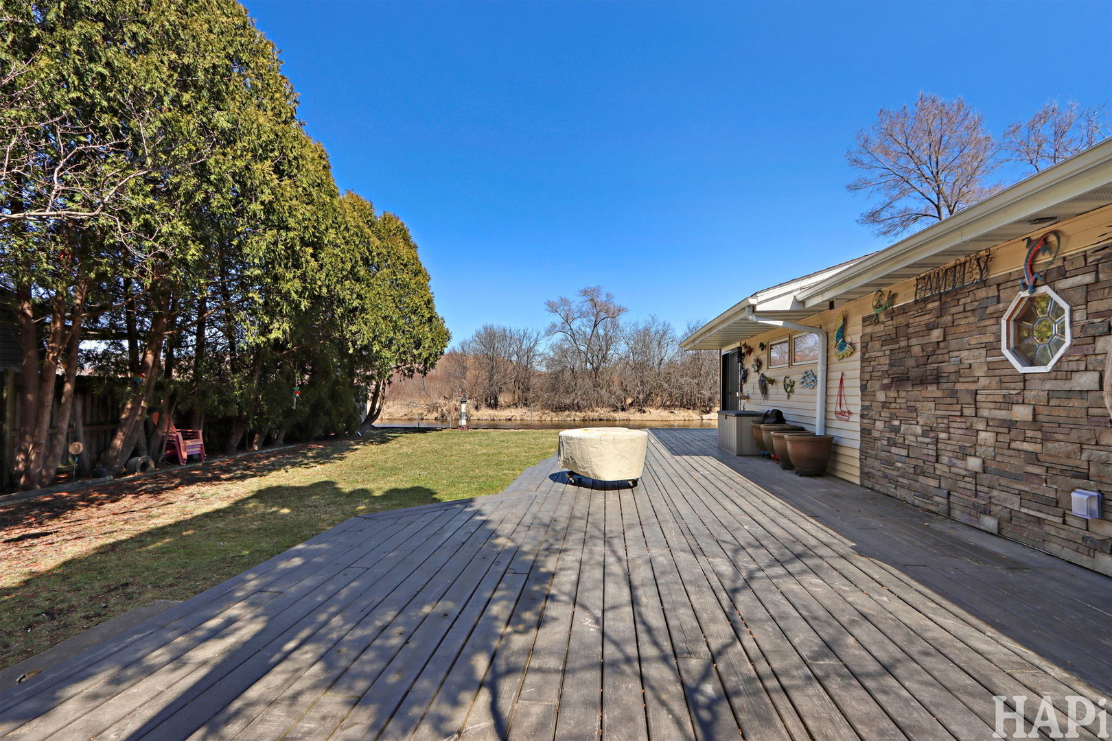 1319 Nippersink Drive Spring Grove, IL 60081 - Photo 18 of 27 a view of a house with backyard and sitting area