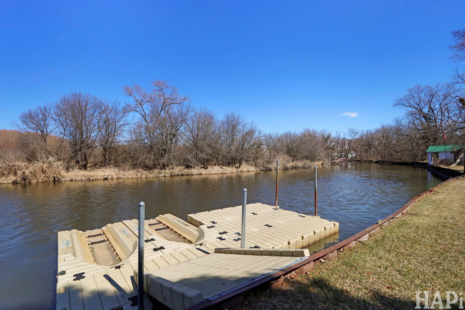 1319 Nippersink Drive Spring Grove, IL 60081 - Photo 20 of 27 a view of a lake with houses