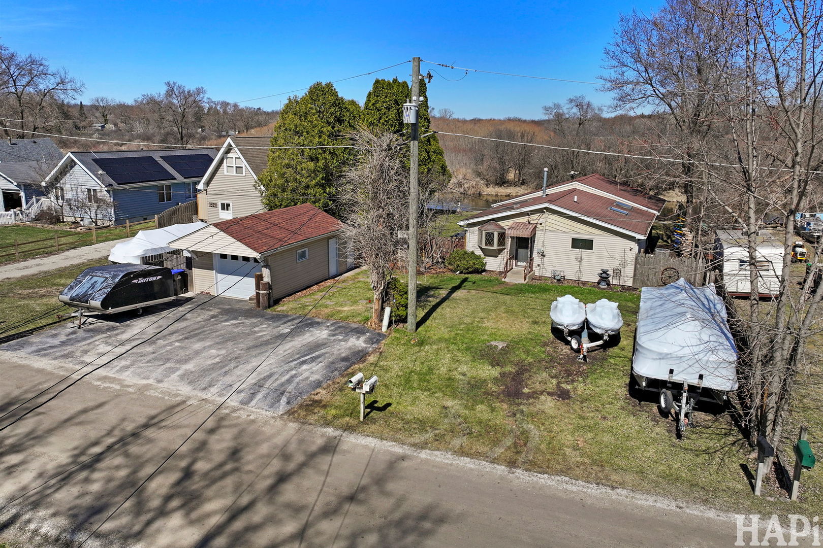 1319 Nippersink Drive Spring Grove, IL 60081 - Photo 22 of 27 a aerial view of a house with table and chairs