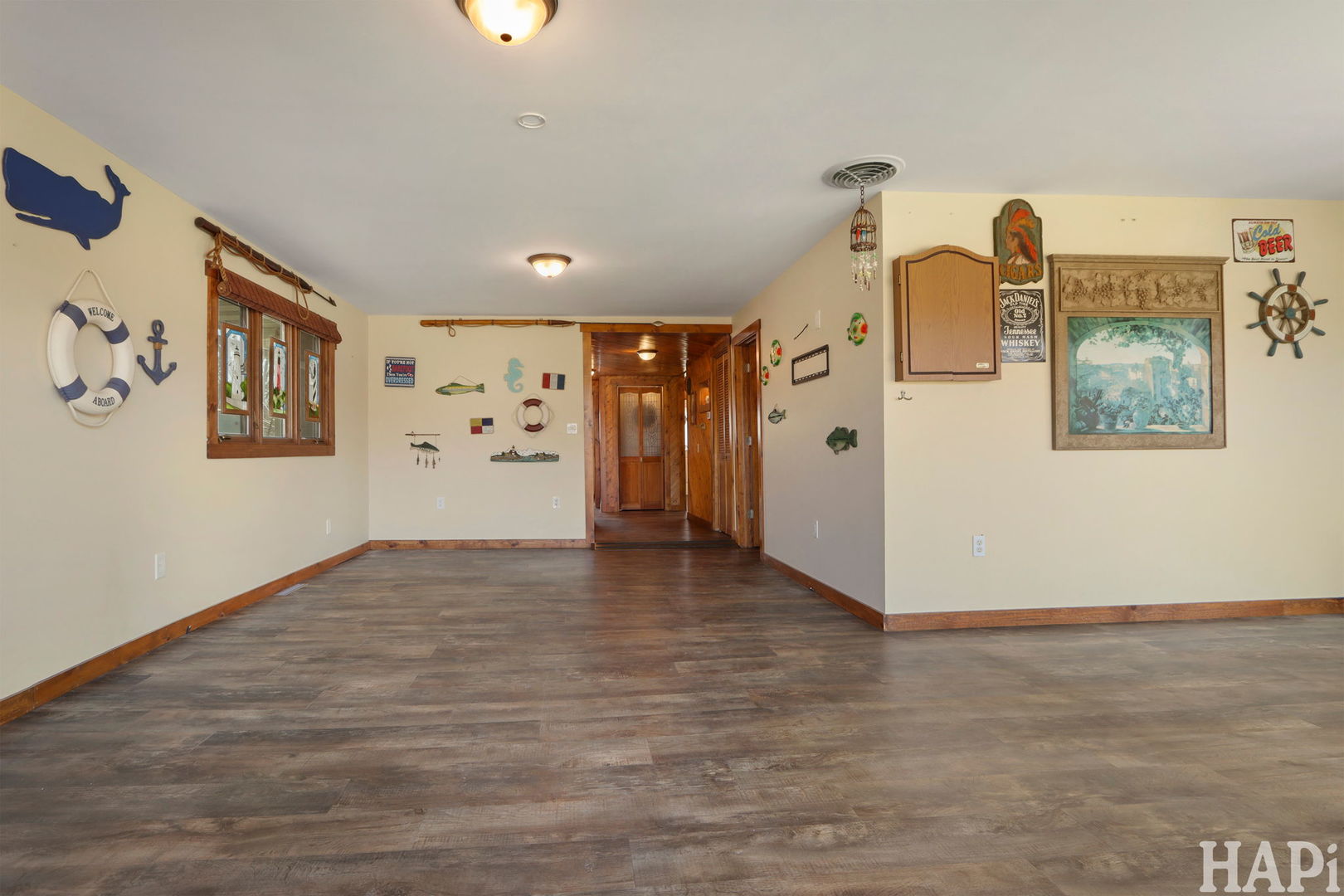 1319 Nippersink Drive Spring Grove, IL 60081 - Photo 7 of 27 a view of a livingroom with a ceiling fan