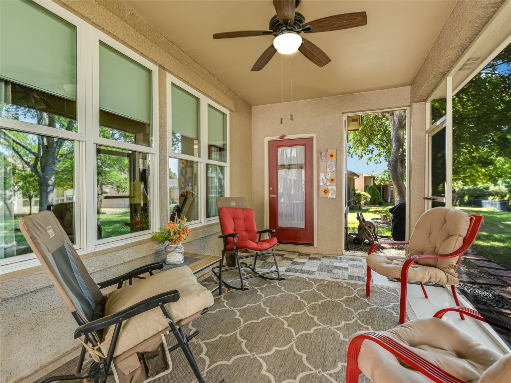 Screened Back Porch is outfitted with 2 ceiling fans - great for those hot summer Texas days.