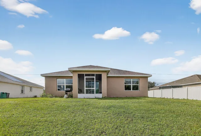 a view of a lake with a big yard