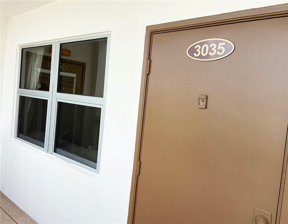 3035 Guildford East, Unit 3035 Boca Raton, FL 33434 - Photo 13 of 21 Entry door & Impact windows