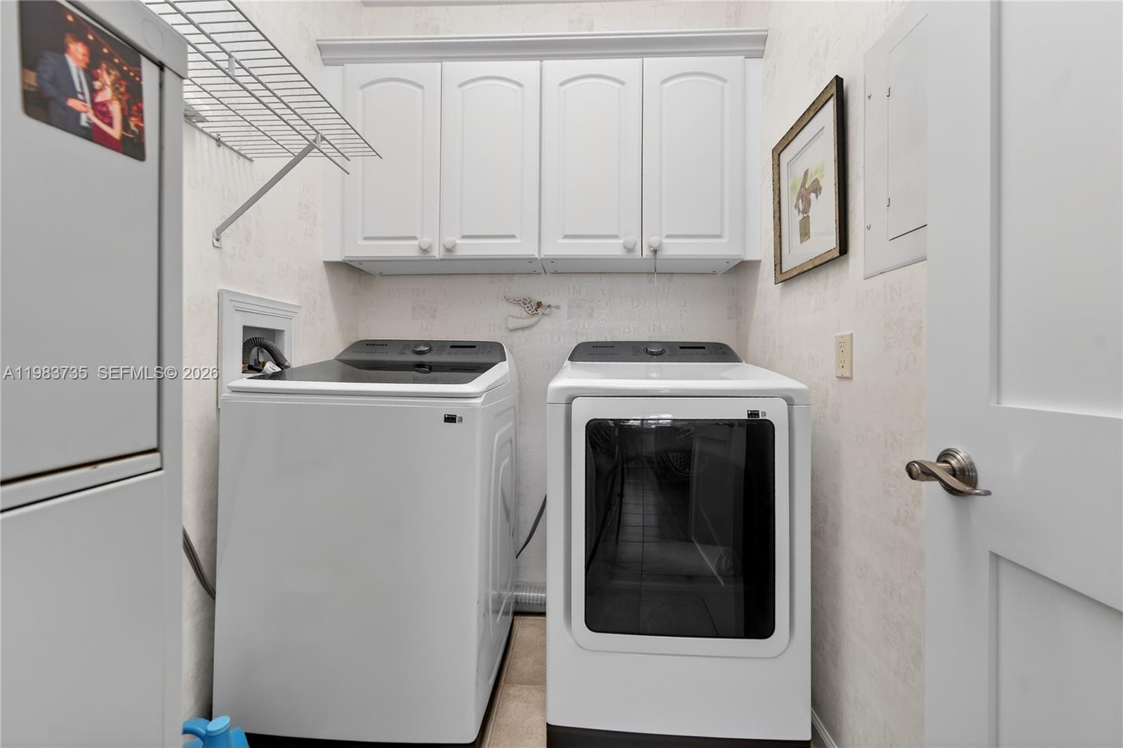 851 Saturn Street, Unit D Jupiter, FL 33477 - Photo 19 of 60 a utility room with dryer and washer